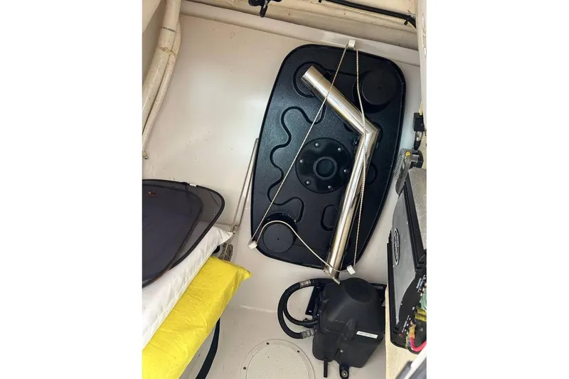 Slide: The Image of Interior view of a 2016 Sailfish 275 DC boat cabin with storage and equipment. - 3
