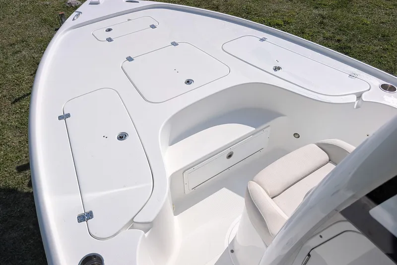 Slide: The Image of 2021 Sea Hunt BX 22 BR boat deck with storage compartments and seating. - 20