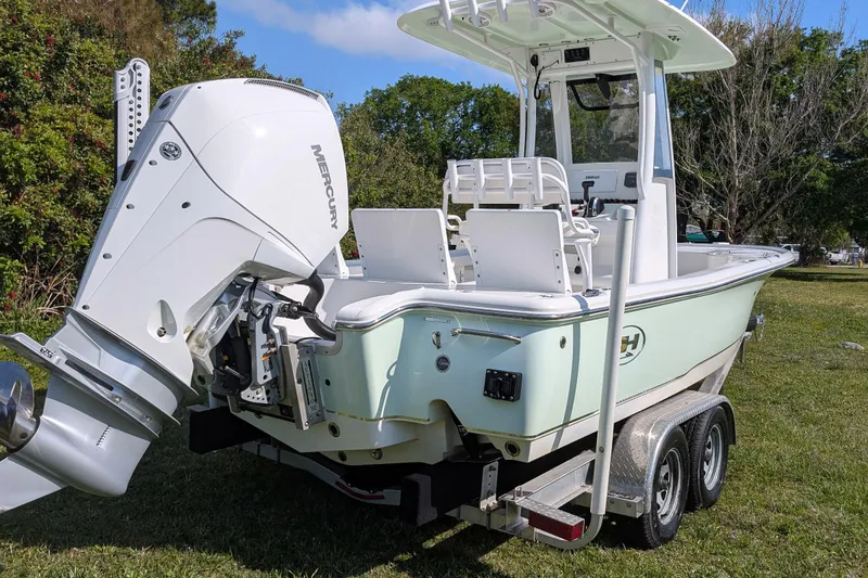 Slide: The Image of 2021 Sea Hunt BX 22 BR boat on trailer with Mercury outboard engine. - 5