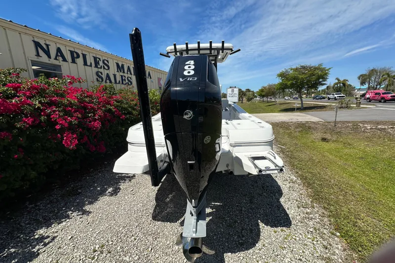 Slide: The Image of 2026 Caymas 26 HB boat with powerful engine at Naples Marina Sales. - 3