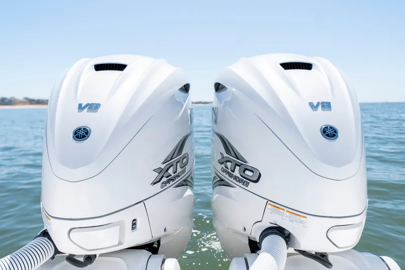 Slide: The Image of Twin Yamaha XTO Offshore V8 engines on a 2021 Caymas 341 CC boat. - 11