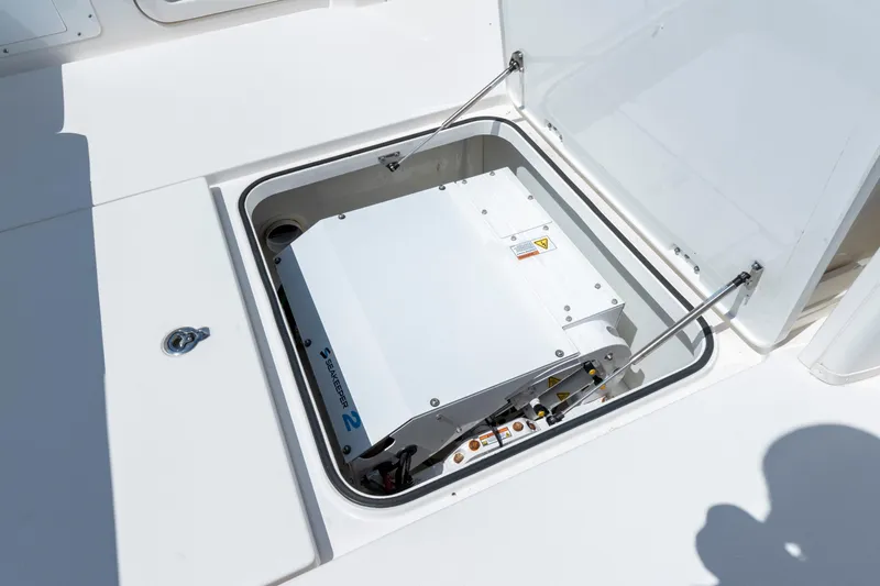 Slide: The Image of 2021 Caymas 341 CC boat with Seakeeper 2 stabilizer installed in open compartment. - 22