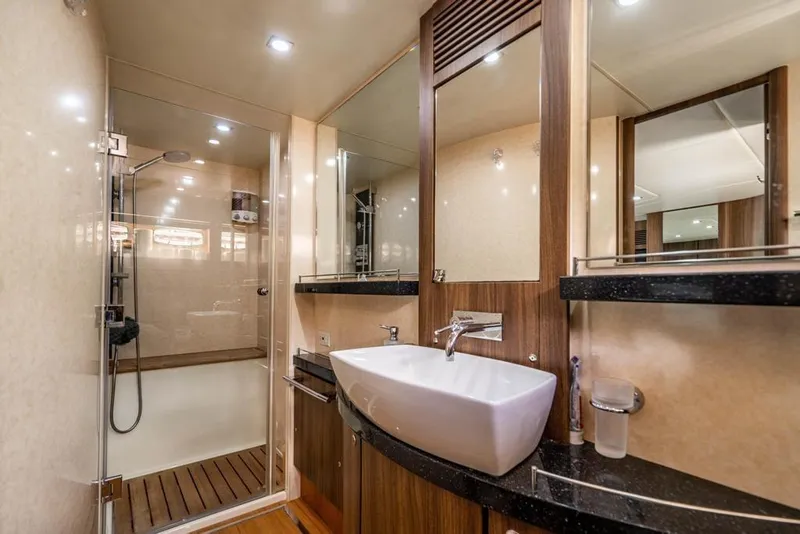 Slide: The Image of Luxurious bathroom in 2020 Fairline 68 yacht with modern fixtures and glass shower. - 58