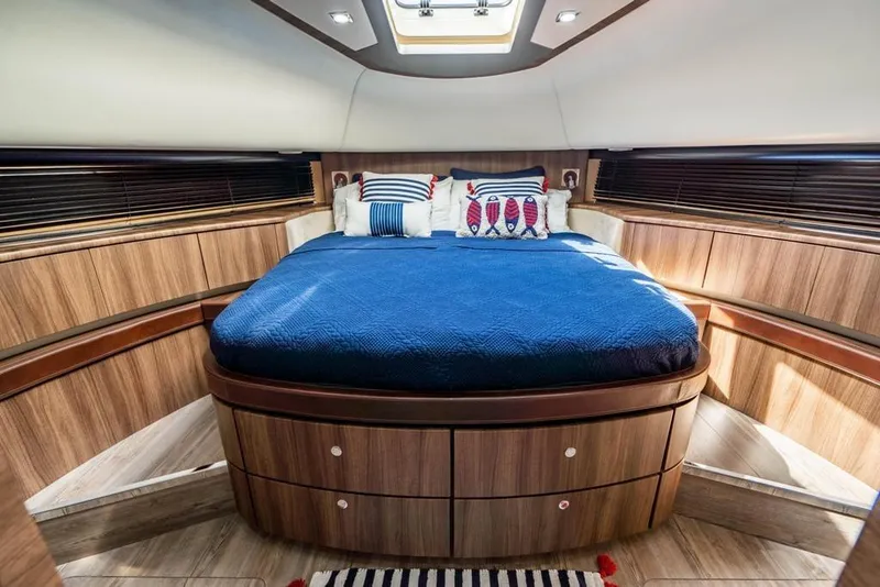 Slide: The Image of Luxurious cabin interior of 2020 Fairline 68 yacht with elegant wood finish. - 43