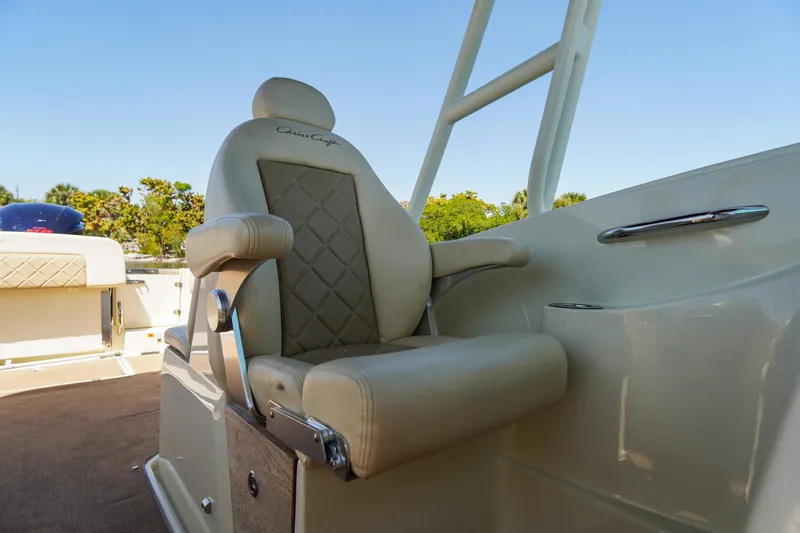 Slide: The Image of Luxurious seating on 2017 Chris-Craft Calypso 26 boat, featuring elegant design and comfort. - 16
