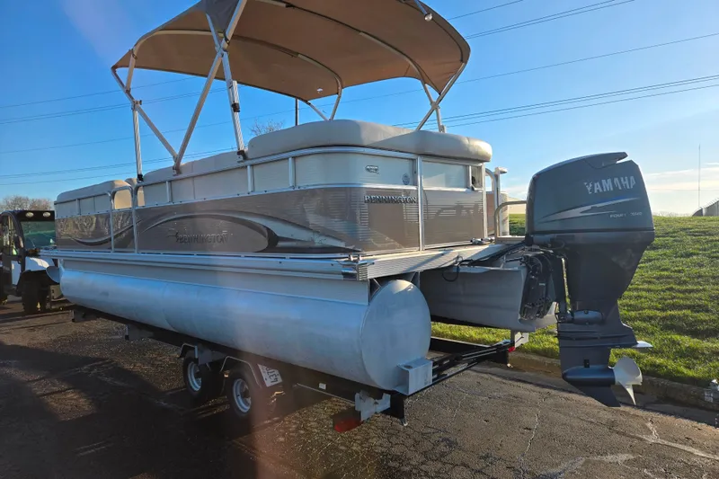 Slide: The Image of 2008 Bennington 2275RL pontoon boat with Yamaha outboard motor on trailer. - 3