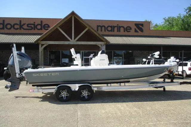 The Image of 2025 Skeeter SX241 boat on trailer outside Dockside Marine dealership. - 0