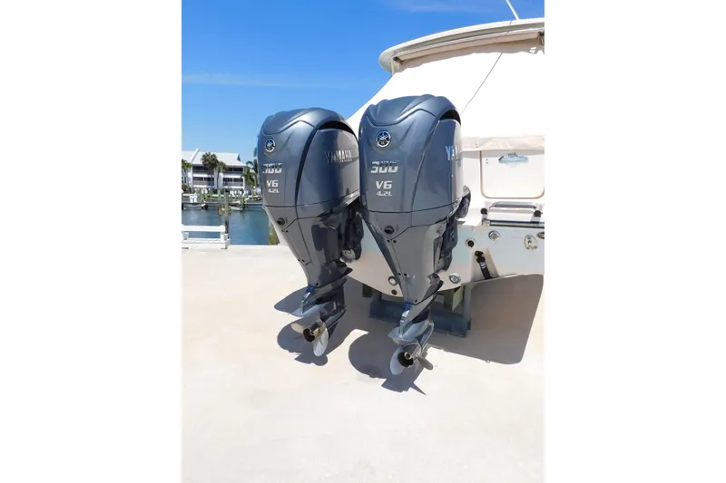 Slide: The Image of Twin Yamaha outboard engines on a 2015 Grady-White Freedom 307 boat. - 4