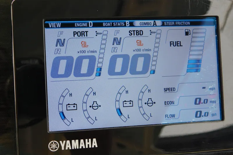 Slide: The Image of Yamaha engine display on 2015 Grady-White Freedom 307 boat, showing RPM and fuel levels. - 26