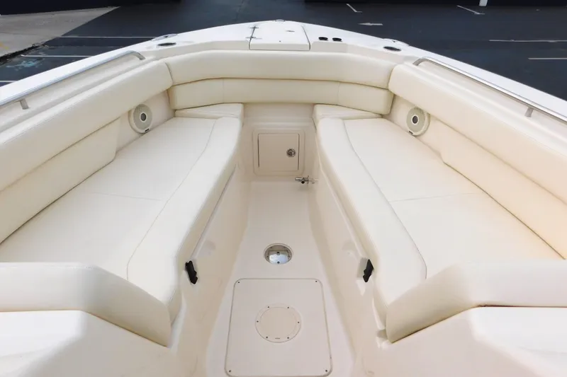 Slide: The Image of 2016 Grady-White Freedom 307 boat interior with spacious seating and storage compartments. - 46