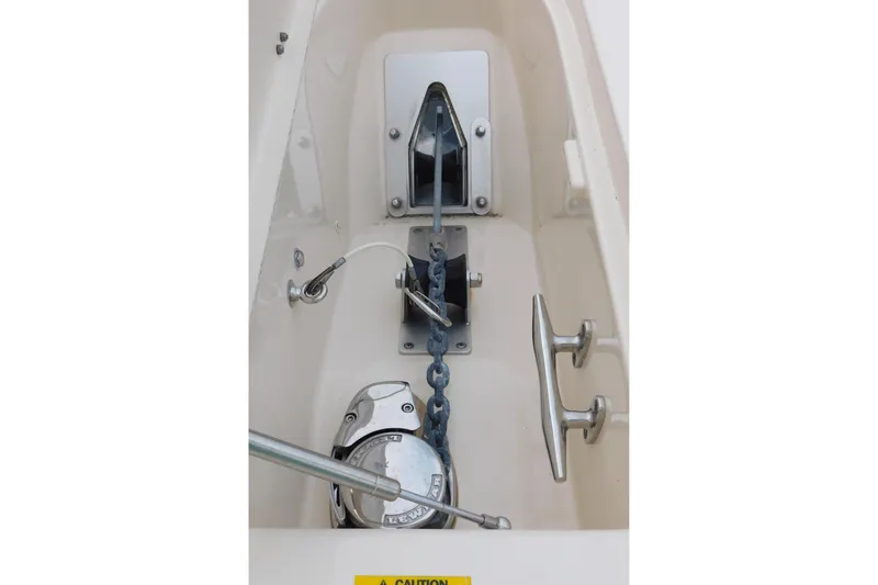 Slide: The Image of Anchor system of 2016 Grady-White Freedom 307 boat, featuring chain and cleat. - 55