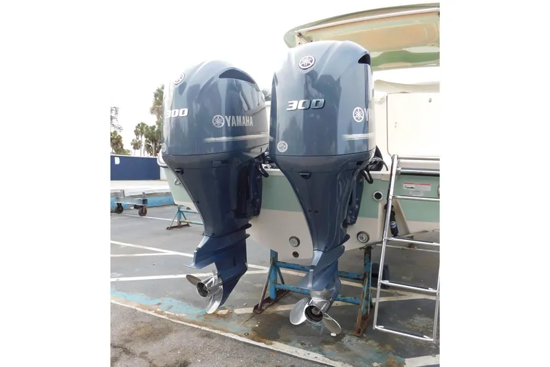 Slide: The Image of Twin Yamaha 300 engines on a 2015 Grady-White Freedom 307 boat. - 7