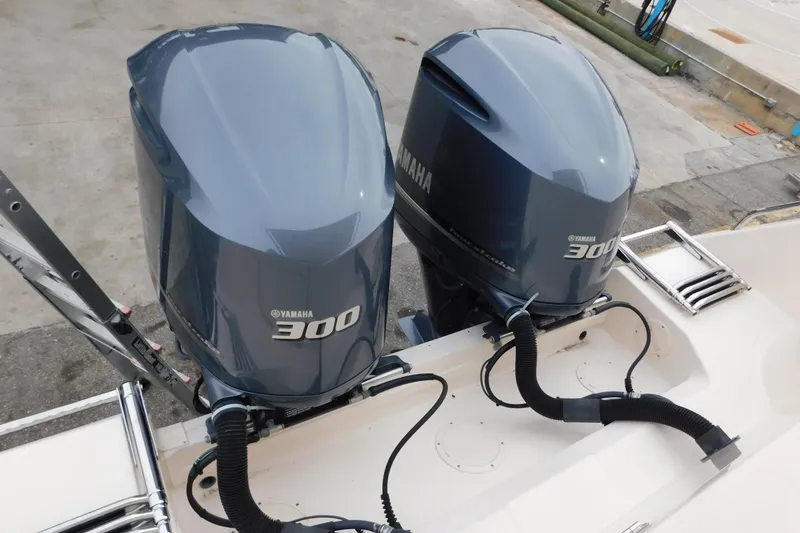 Slide: The Image of Twin Yamaha 300 outboard engines on a 2015 Grady-White Freedom 307 boat. - 9