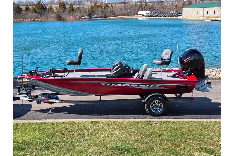 The Image of 2024 Tracker Pro Team 195 TXW Tournament Edition boat by a lake. - 0