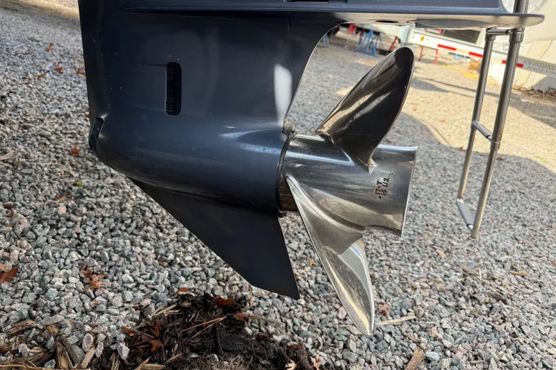 Slide: The Image of Close-up of a 2020 Grady-White Freedom 325 boat propeller on gravel. - 10