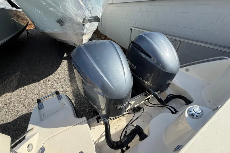 Slide: The Image of 2020 Grady-White Freedom 325 boat with twin Yamaha outboard engines. - 13