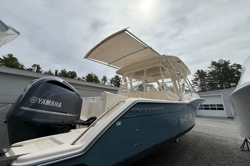 Slide: The Image of 2020 Grady-White Freedom 325 boat with Yamaha engine, parked outdoors. - 45