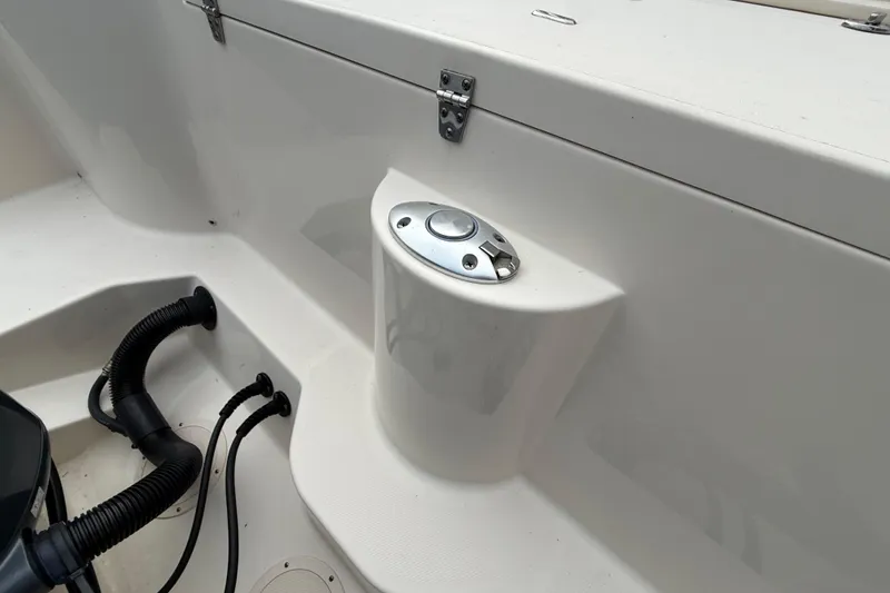 Slide: The Image of 2020 Grady-White Freedom 325 boat interior detail with control panel and wiring. - 47