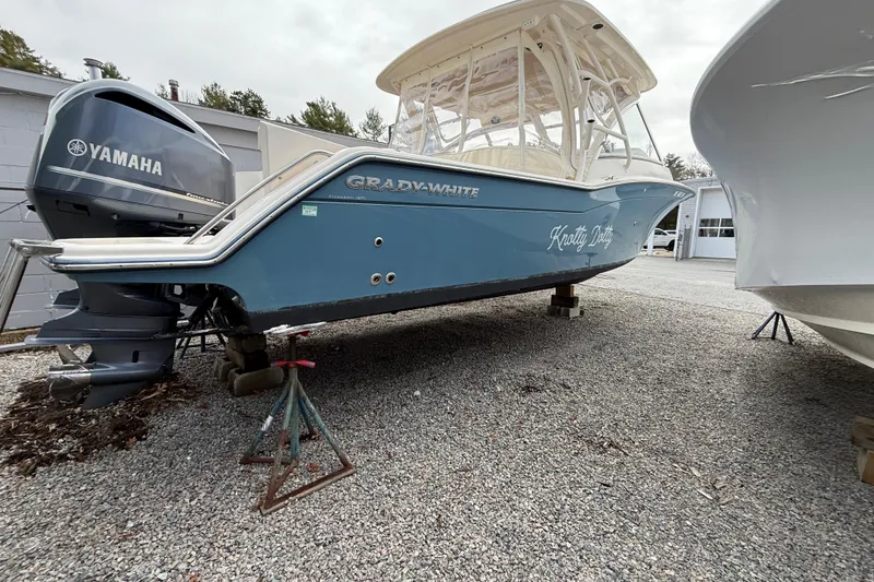 Slide: The Image of 2020 Grady-White Freedom 325 boat with Yamaha engine on gravel lot. - 49