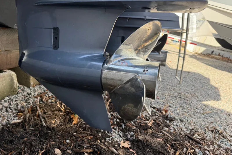 Slide: The Image of Close-up of a 2020 Grady-White Freedom 325 boat propeller on gravel. - 9