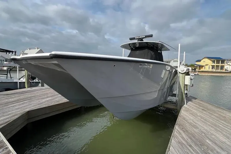 The Image of Freeman 37VH 2022 boat docked at marina under cloudy sky. - 0