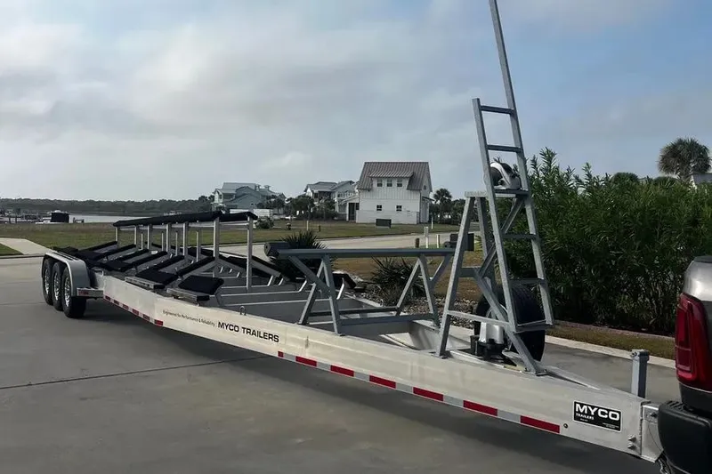 Slide: The Image of Boat trailer by Myco Trailers, parked outdoors, Freeman 37VH, 2022 model. - 13