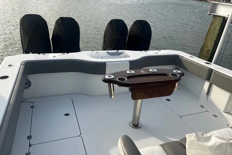 Slide: The Image of Freeman 37VH 2022 boat deck with covered engines and fishing station. - 8