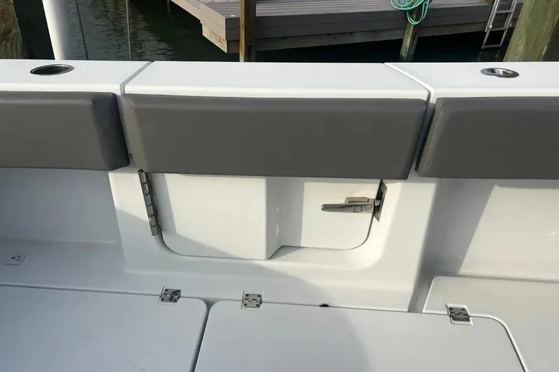 Slide: The Image of Freeman 37VH 2022 boat interior with cushioned seating and storage compartments. - 9