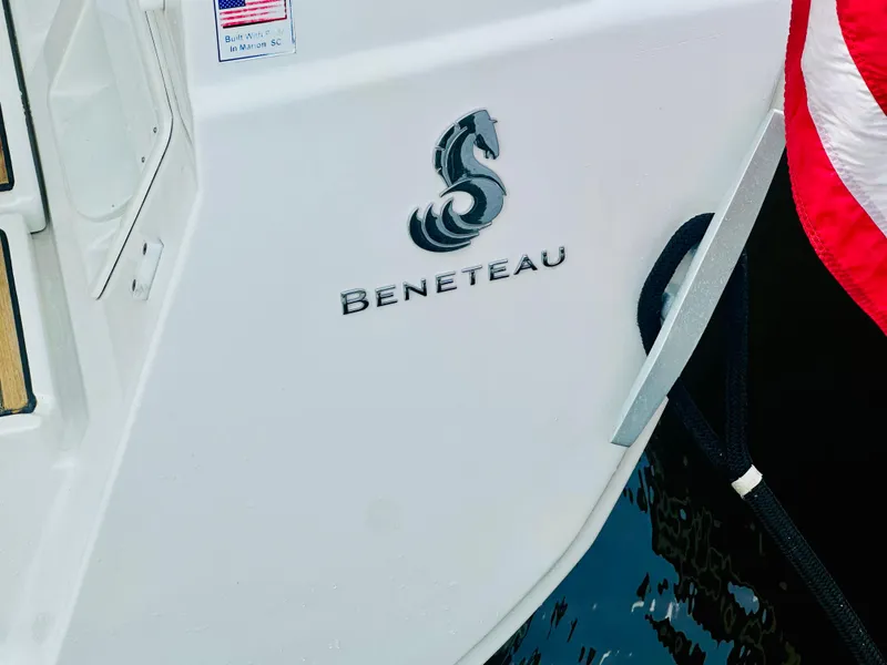 Slide: The Image of Beneteau Oceanis 45 yacht, 2015 model, with logo and American flag detail. - 23