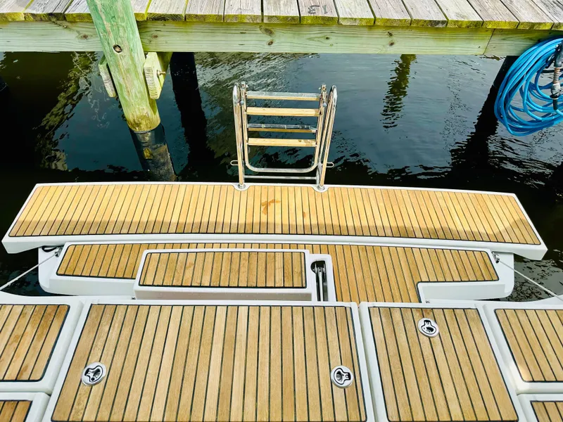 Slide: The Image of Teak swim platform on 2015 Beneteau Oceanis 45 yacht, dockside view. - 41