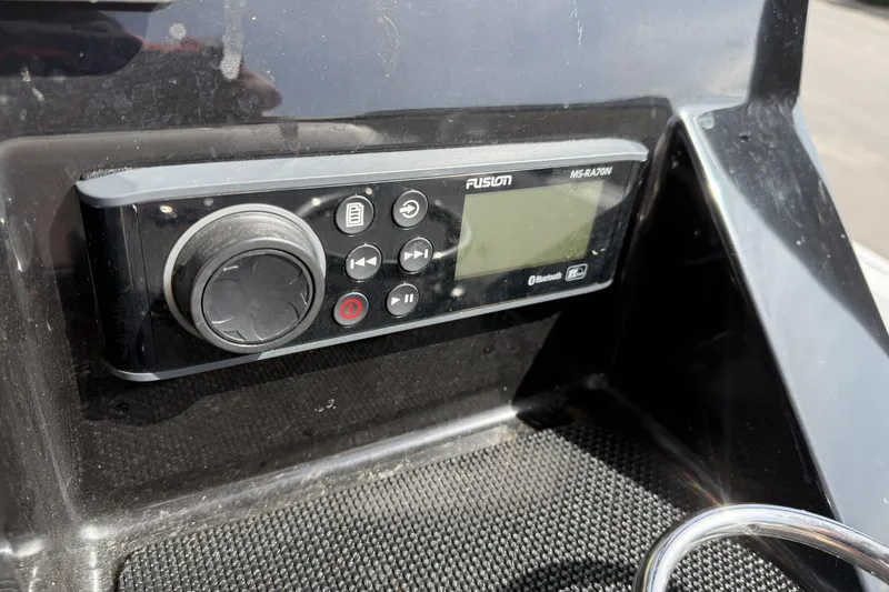 Slide: The Image of Fusion MS-RA70N stereo system on 2019 Wellcraft 221 Bay boat dashboard. - 14
