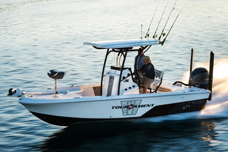 Slide: The Image of Manufacturer Provided Image: 2019 Wellcraft 221 Bay boat cruising on water, equipped for fishing. - 25