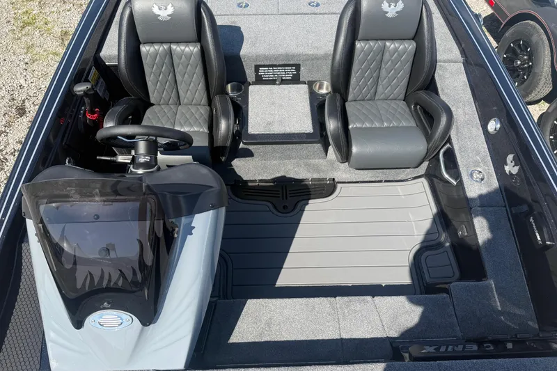 Slide: The Image of 2026 Phoenix 721 ZXL boat interior with dual seats and steering console. - 11