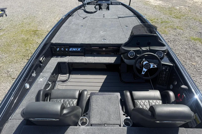 Slide: The Image of 2026 Phoenix 721 ZXL boat interior with steering wheel and seating. - 17
