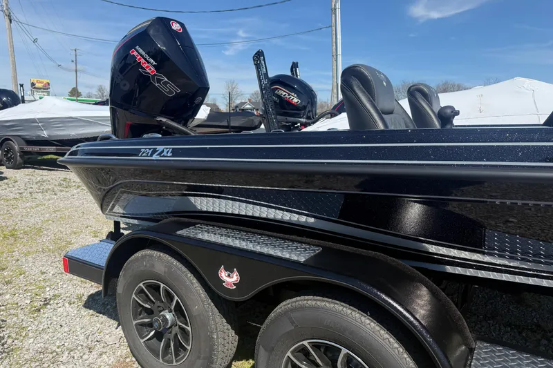Slide: The Image of 2026 Phoenix 721 ZXL boat with Mercury Pro XS engine, parked on a trailer. - 8