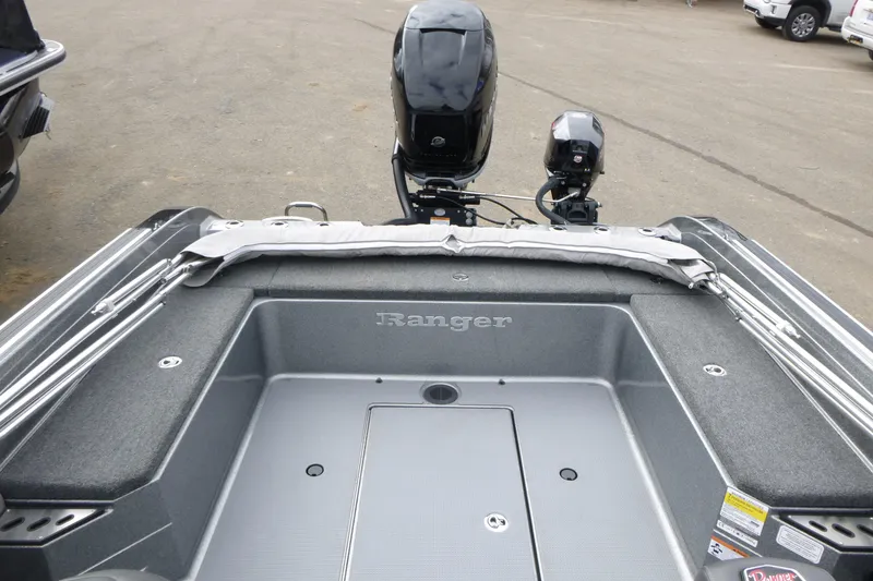 Slide: The Image of 2023 Ranger 622FS Pro boat interior with motor, showcasing spacious deck design. - 10
