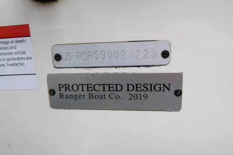 Slide: The Image of 2023 Ranger 622FS Pro boat identification and protected design plates. - 12