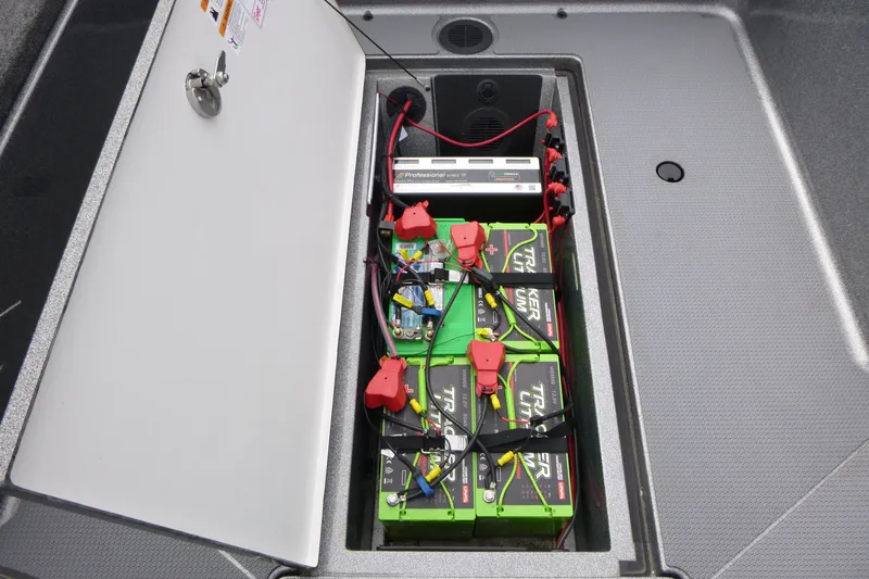 Slide: The Image of Battery compartment of 2023 Ranger 622FS Pro boat with Tracker lithium batteries. - 13