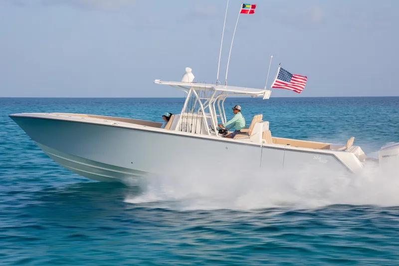 The Image of 2021 SeaVee Boats 370Z cruising on clear blue ocean waters. - 1