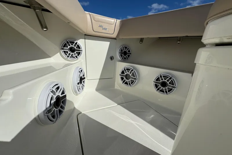 Slide: The Image of 2021 SeaVee Boats 370Z interior with multiple speakers and sleek design. - 13