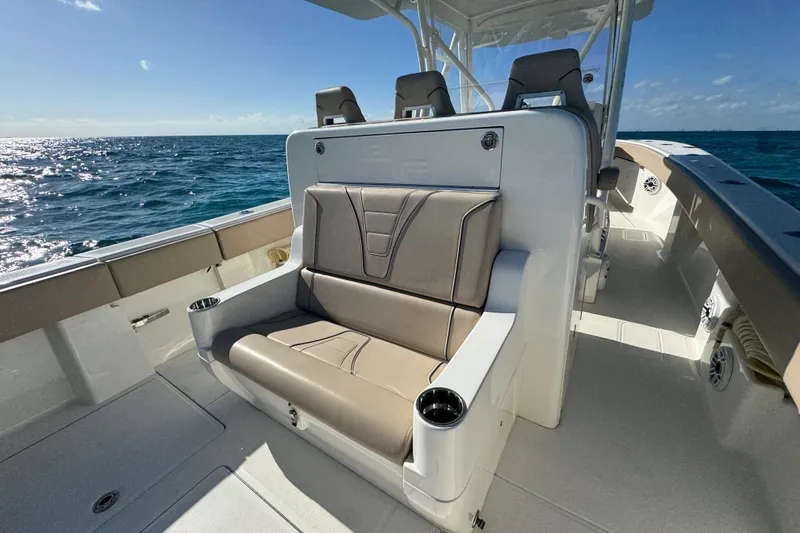Slide: The Image of 2021 SeaVee Boats 370Z interior with comfortable seating on open water. - 17