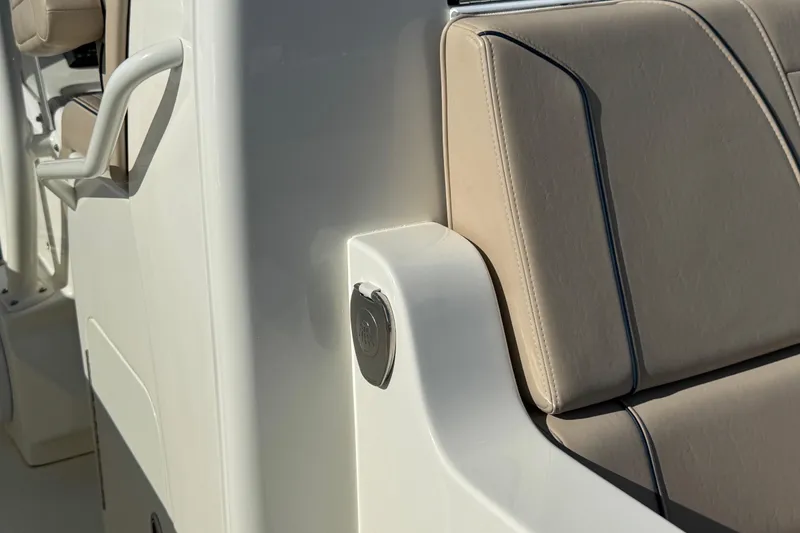 Slide: The Image of 2021 SeaVee Boats 370Z interior seating detail with beige upholstery and sleek design. - 24