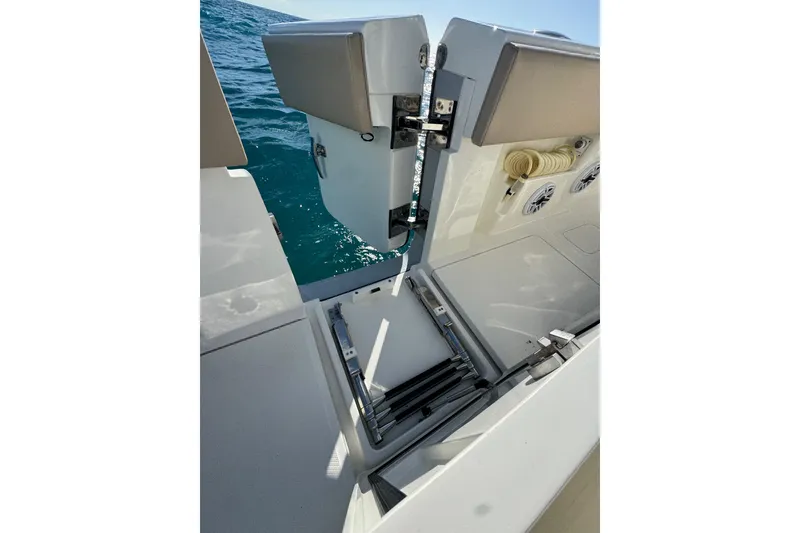 Slide: The Image of 2021 SeaVee Boats 370Z swim platform with ladder and ocean view. - 25