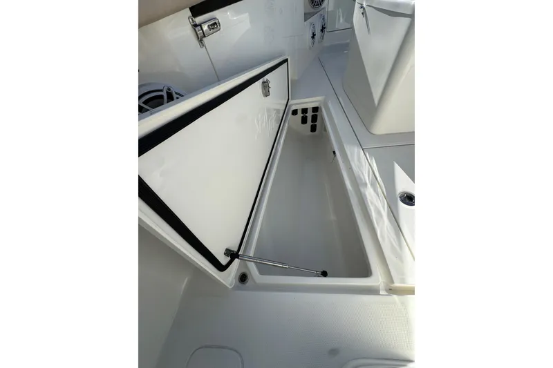 Slide: The Image of Open storage compartment on a 2021 SeaVee Boats 370Z, showcasing interior space. - 26