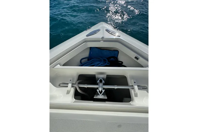 Slide: The Image of Bow storage compartment of 2021 SeaVee Boats 370Z with anchor and rope. - 28
