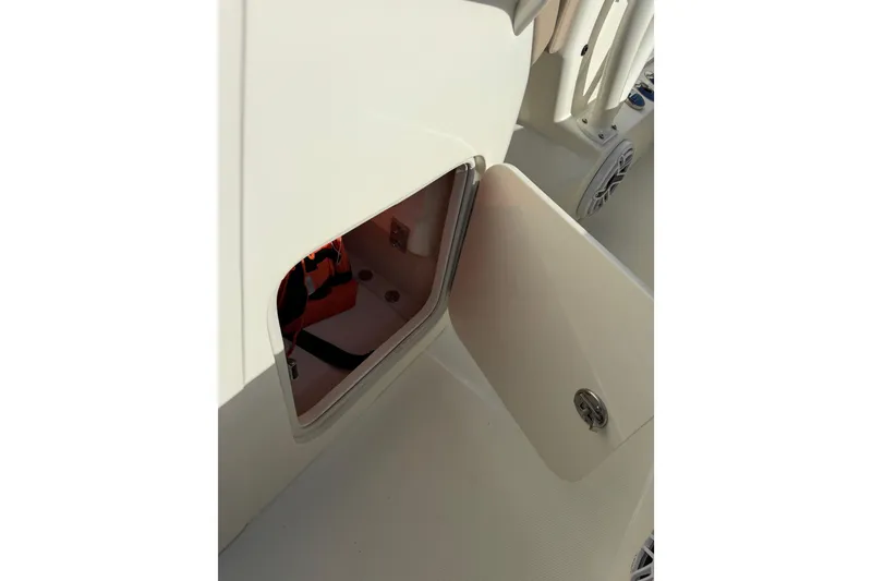 Slide: The Image of Open storage compartment on a 2021 SeaVee Boats 370Z, showcasing interior space. - 32