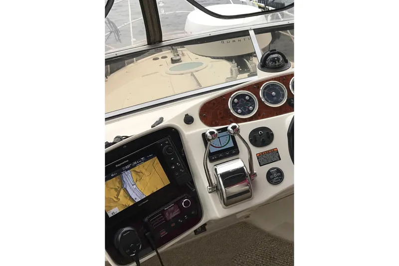 Slide: The Image of 2004 Meridian 408 Motoryacht helm with navigation system and control panel. - 6