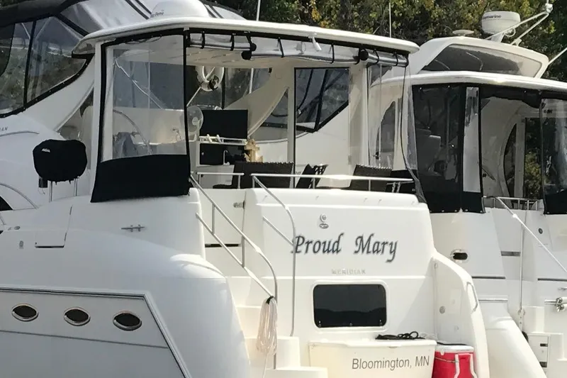 Slide: The Image of 2004 Meridian 408 Motoryacht named "Proud Mary" docked in Bloomington, MN. - 7