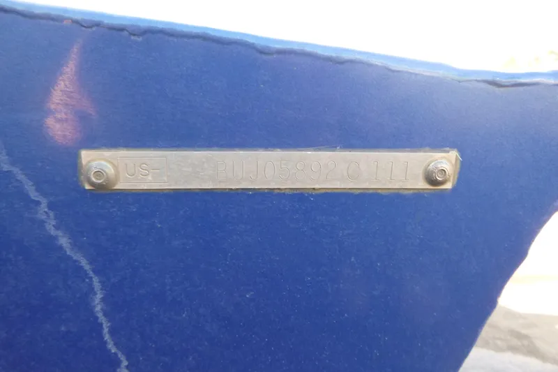 Slide: The Image of Metal identification plate on a 2011 Tracker Pro Team 175 TF boat. - 17