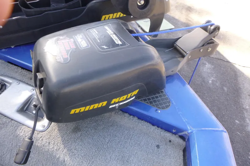 Slide: The Image of Minn Kota trolling motor on 2011 Tracker Pro Team 175 TF boat deck. - 9